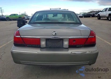 1999 Mercury Grand Marquis Gs z USA, uszkodzony, nr VIN 2MEFM74W5XX674144